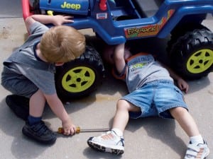broken_jeeps_sideways+two_kid_mechanics