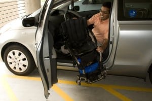 16393-a-disabled-man-in-a-wheelchair-getting-out-of-a-car-pv