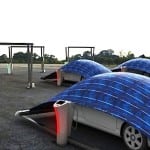A tent protects and charges an EV
